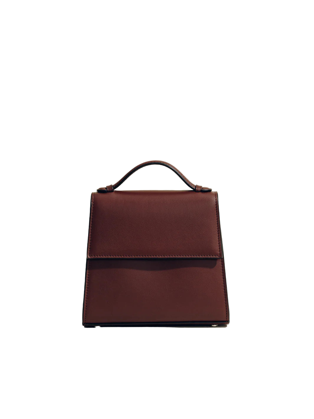 Brown leather handbag on a beige background