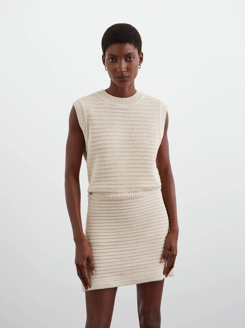 Model wearing Soft Goat Crochet Mini Skirt in Beige