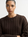 Detail shot of Model wearing Soft goat Cashmere Cable Sweater in Mocha 