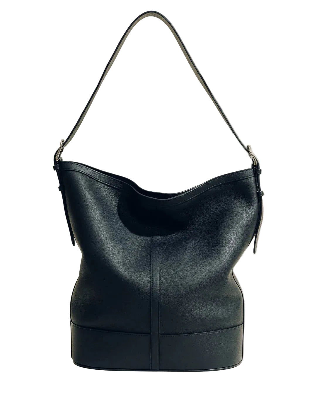 Black leather handbag on a beige background